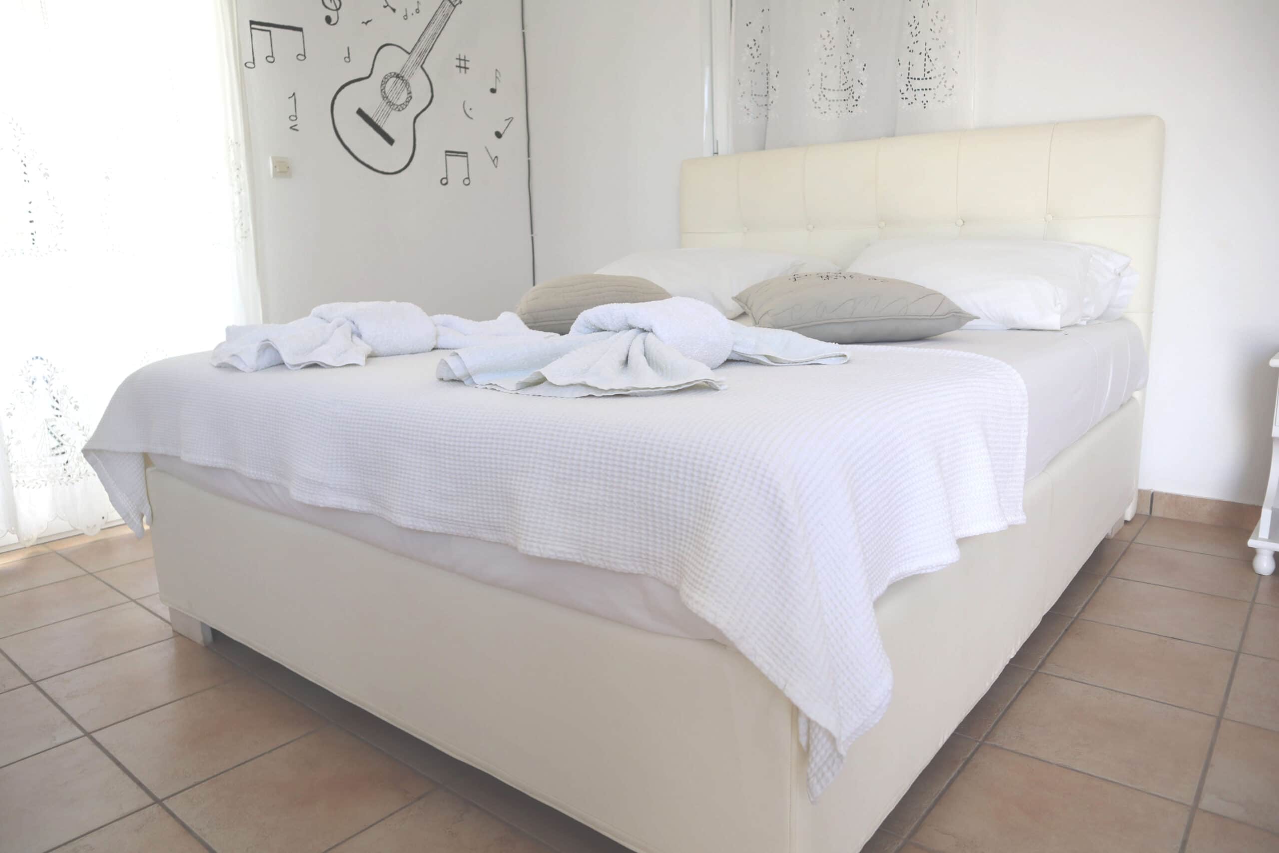 Bright double bedroom of Honeymoon Suite in Ambelas Paros
