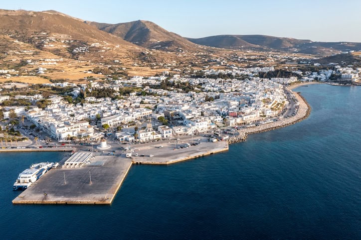 Aerial view of Parikia port on Paros island with the waterfront and town buildings