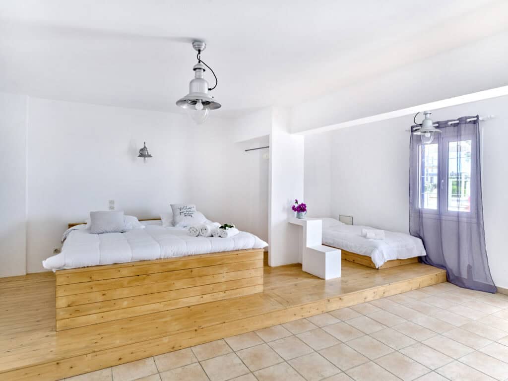 Pool-view terrace from the White & Blue Room - Ambelas Paros sea-view accommodation