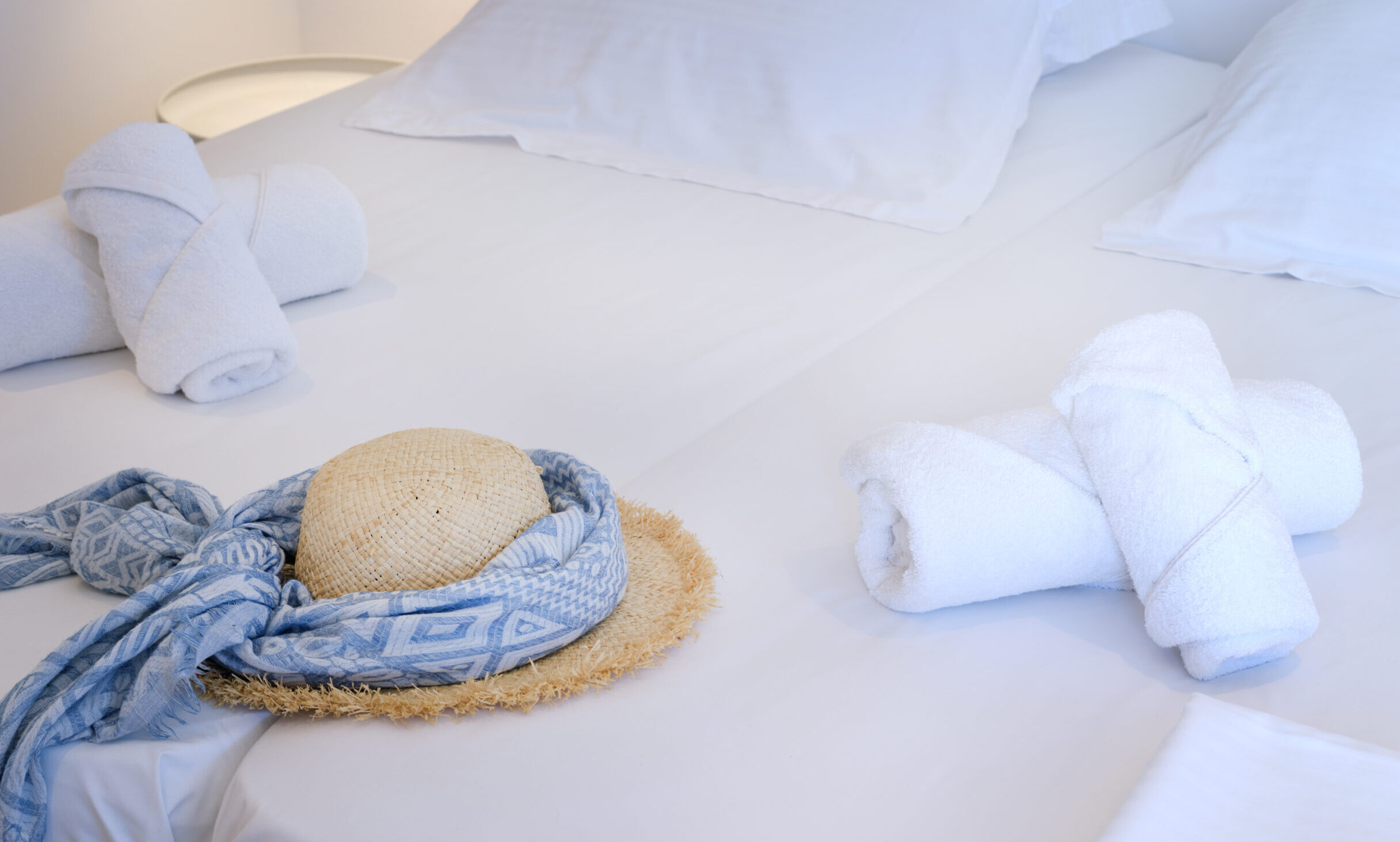 Bright and comfortable room interior with air conditioning, kitchenette and sea view at Fyrogenis Palace in Ambelas, Paros