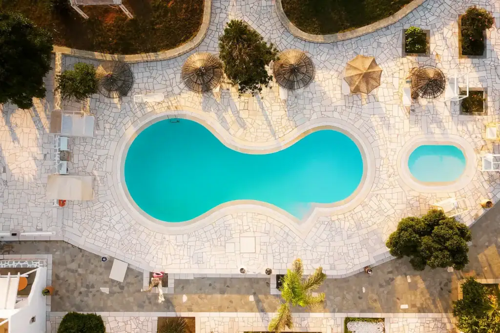 Aerial view of the swimming pool area at Fyrogenis Palace in Ambelas, Paros