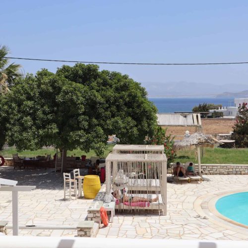 Outdoor dining area with sea view - Aegean Grand Apartment Ambelas Paros