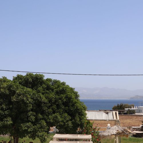 Sea-view from Aegean Grand Apartment in Ambelas Paros with garden landscape