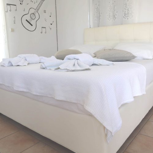 Bright double bedroom of Honeymoon Suite in Ambelas Paros