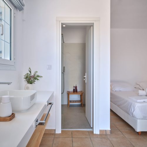 White & Blue room bathroom and bedroom connection in Ambelas, Paros
