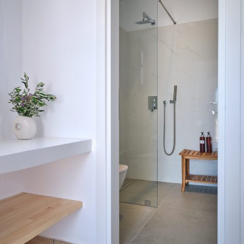 Bathroom shower of the White & Blue room with modern design in Paros