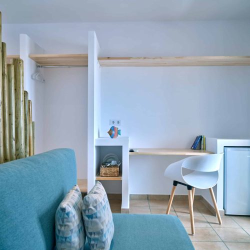 White & Blue room interior with soft blue décor in Paros island