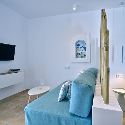 White & Blue room TV area and sitting corner in Ambelas, Paros