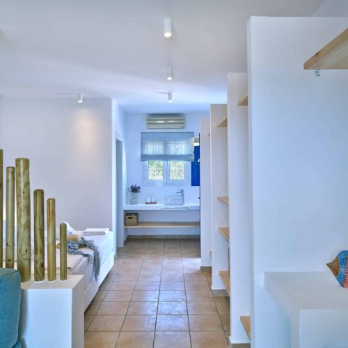 White & Blue room bedroom with Cycladic wooden panels in Paros island