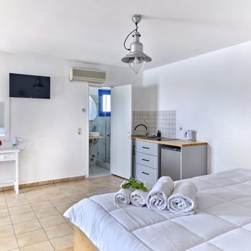 White & Blue Room double bed and open layout - family-friendly accommodation in Ambelas Paros