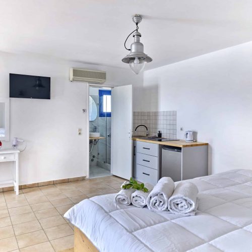 White & Blue Room double bed and open layout - family-friendly accommodation in Ambelas Paros
