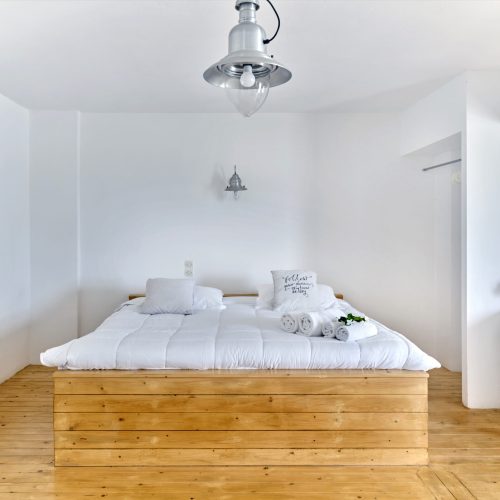 Spacious White & Blue Room with double bed and wooden flooring - Ambelas Paros rooms