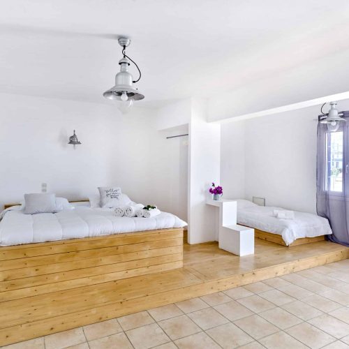 Pool-view terrace from the White & Blue Room - Ambelas Paros sea-view accommodation