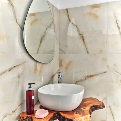 White & Blue Room bathroom with mirror and natural wood sink - Ambelas Paros guest accommodation